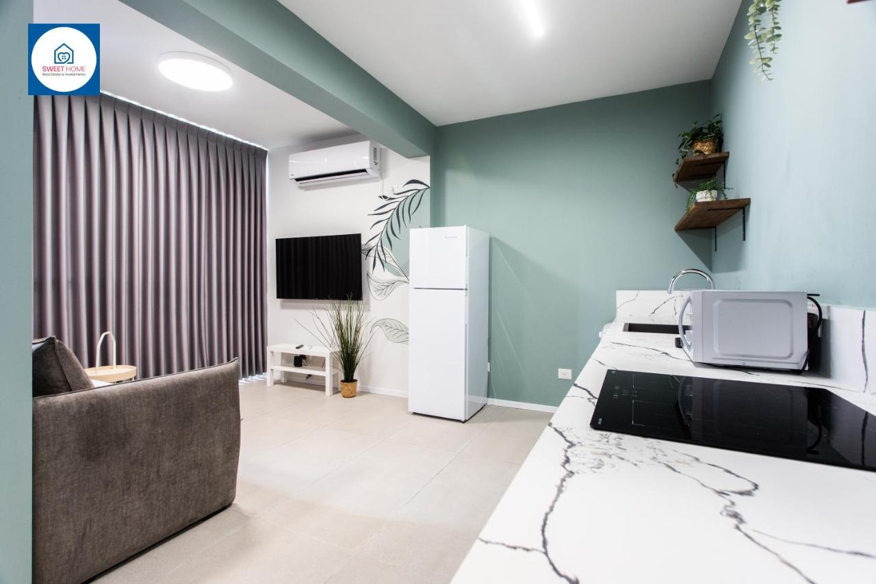 Design Apartments In 内坦亚 外观 照片