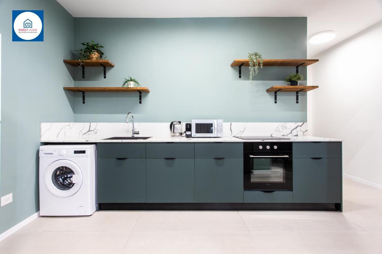 Design Apartments In 内坦亚 外观 照片